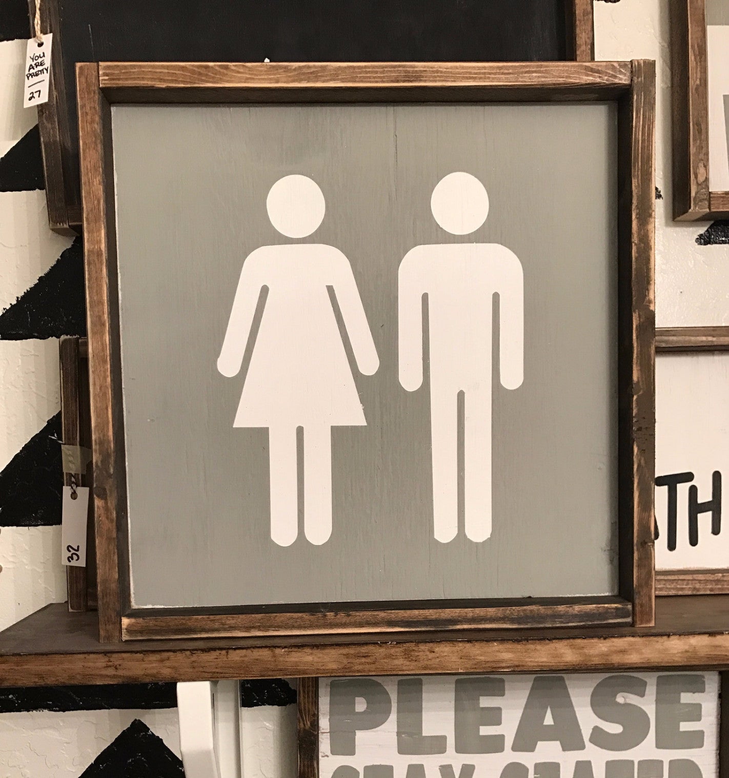 male-and-female-bathroom-sign-jaxnblvd