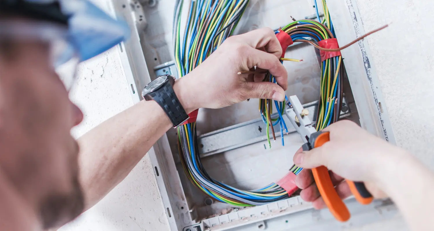 The electrician is testing the circuit