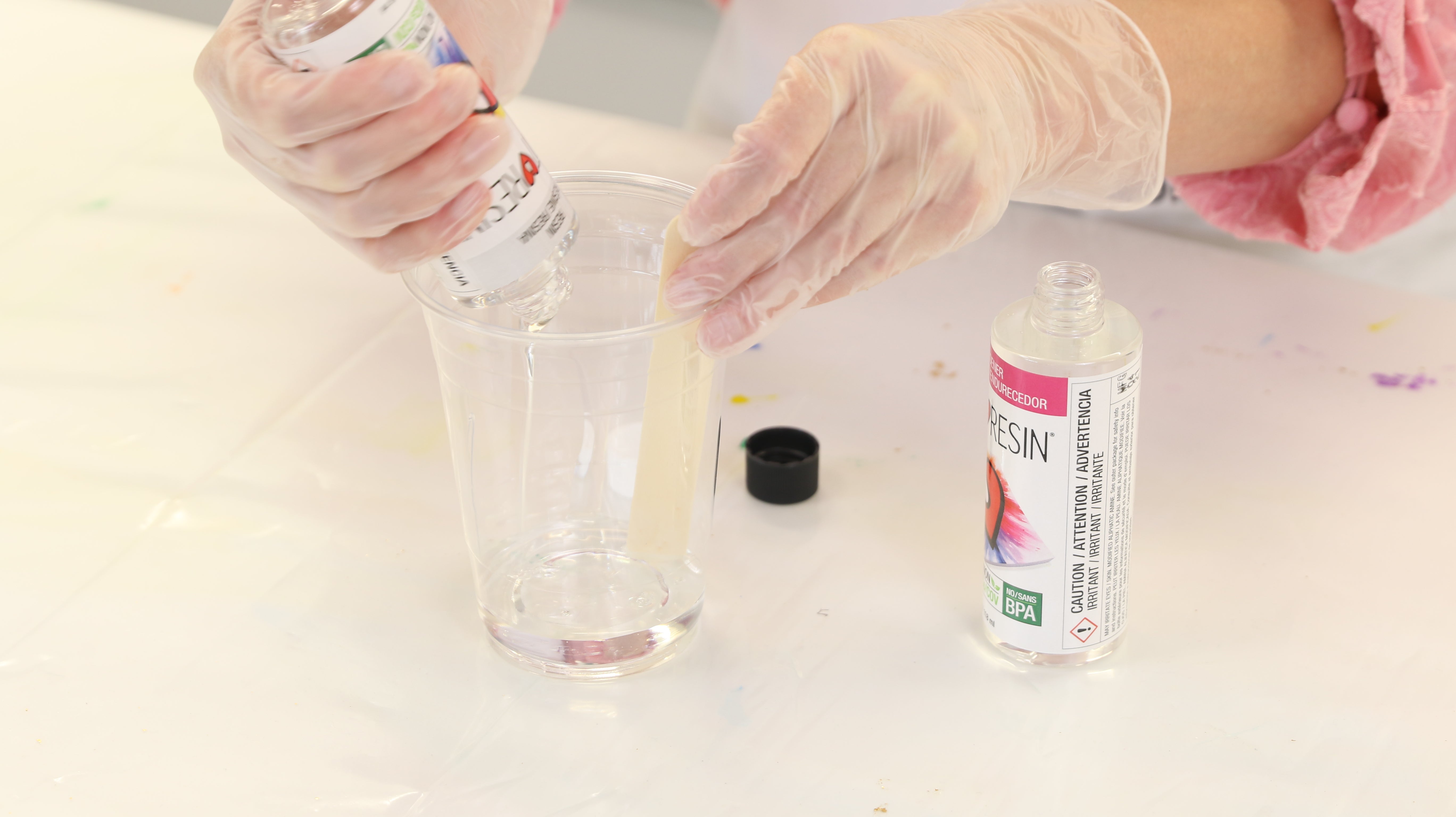 measuring resin in mixing cup