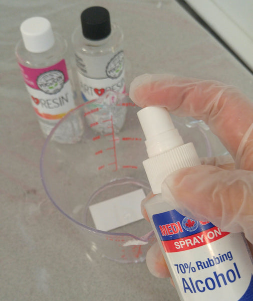 Cleaning Epoxy Resin Mixing Containers - apply the rubbing alcohol using a spray bottle