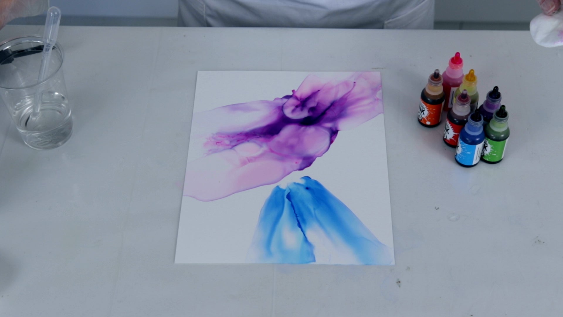 alcohol ink on yupo paper fade effect using hand blow tool