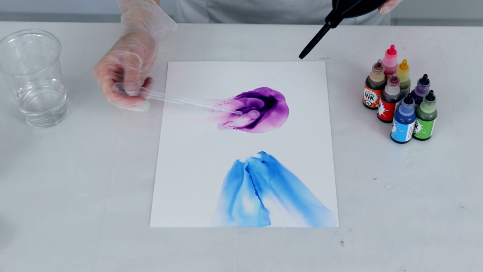 apply isopropyl alcohol to alcohol ink to fade it out