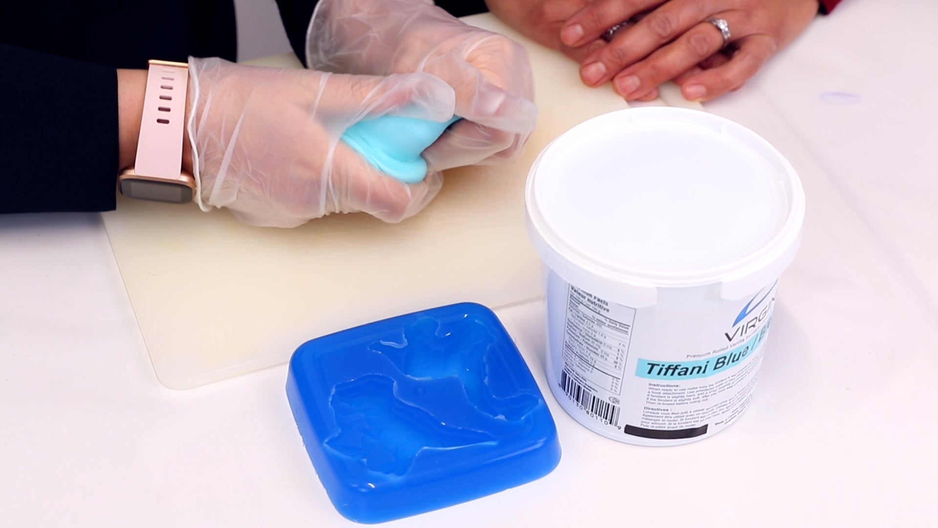 use gloved hands to knead and soften fondant
