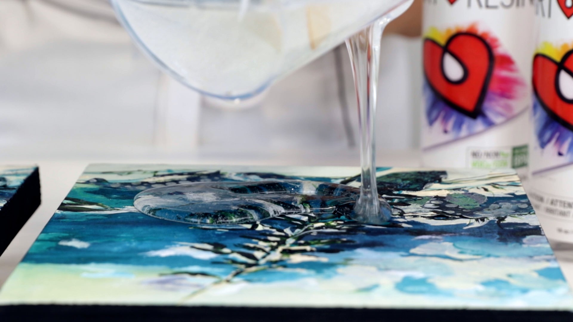 pour resin in the center of the mixed media panel
