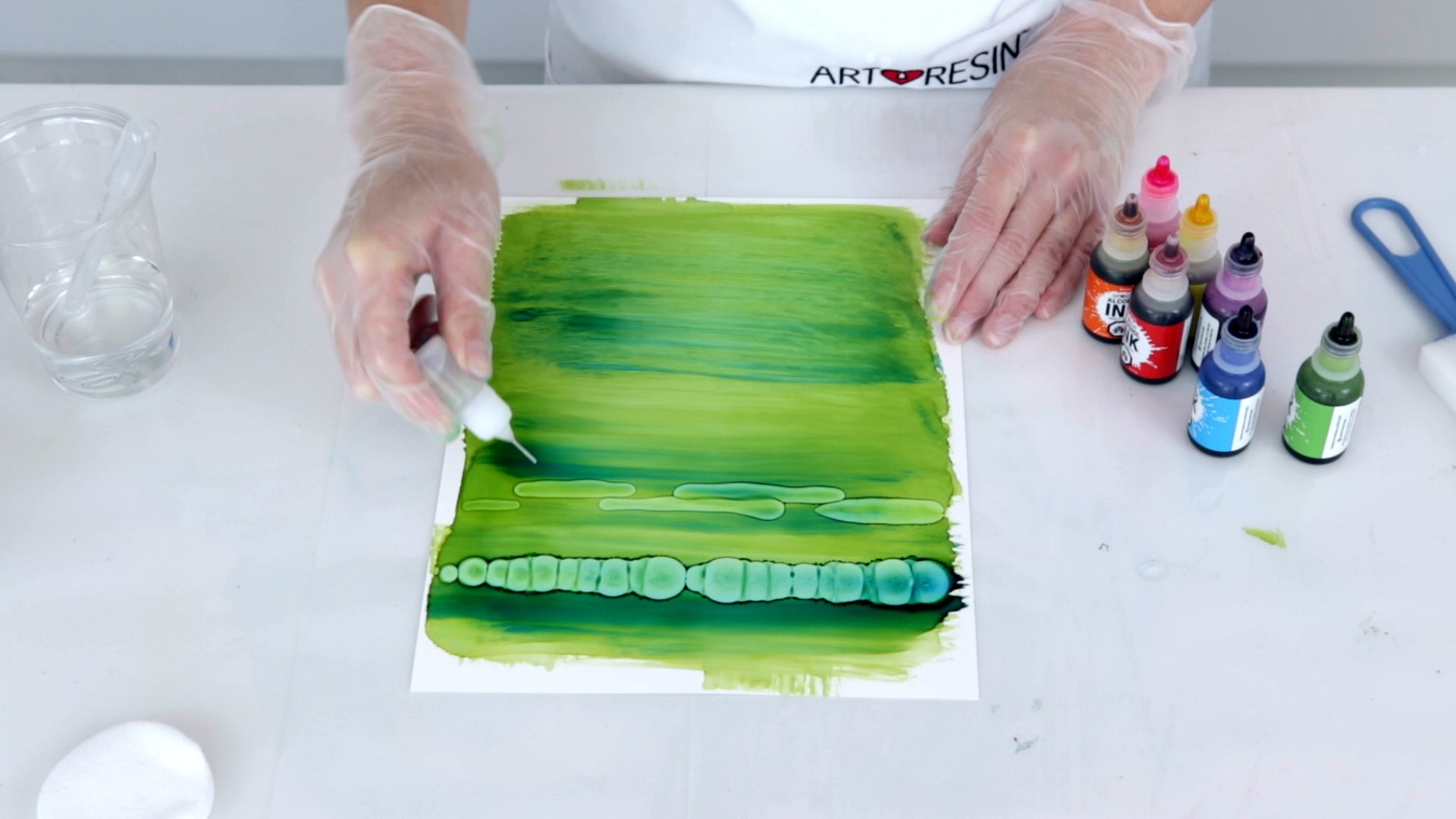 use isopropyl alcohol to draw lines in alcohol ink to create texture