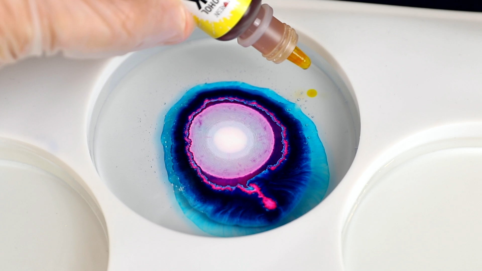 drop alcohol ink into resin coaster mold