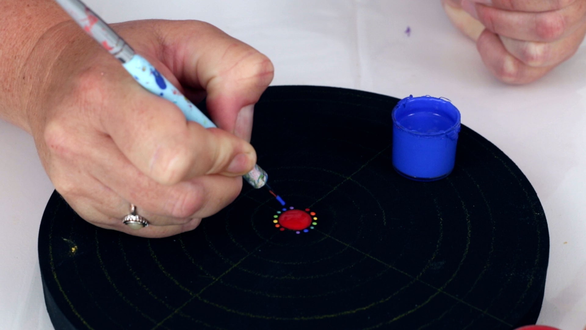 apply blue dots to first row of mandala art design