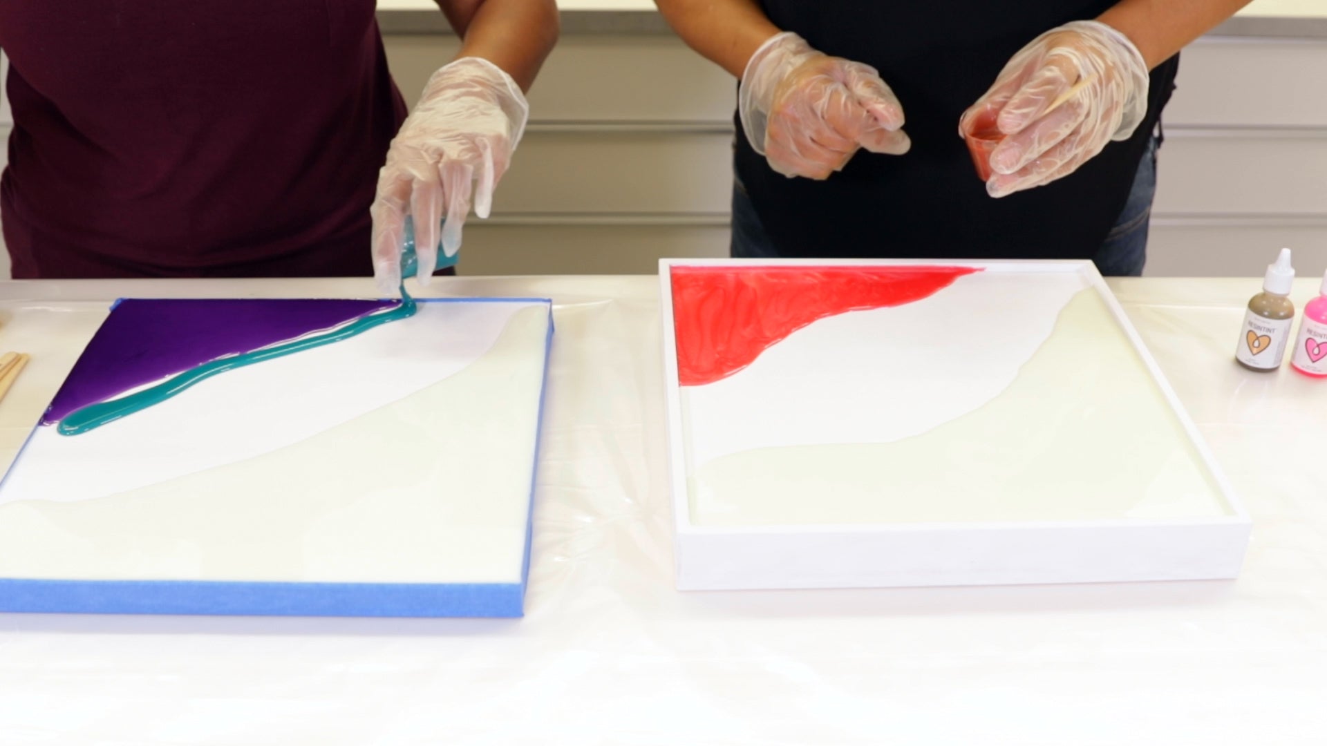 Create Resin Flow Art - pour your third colour down in a ribbon fashion