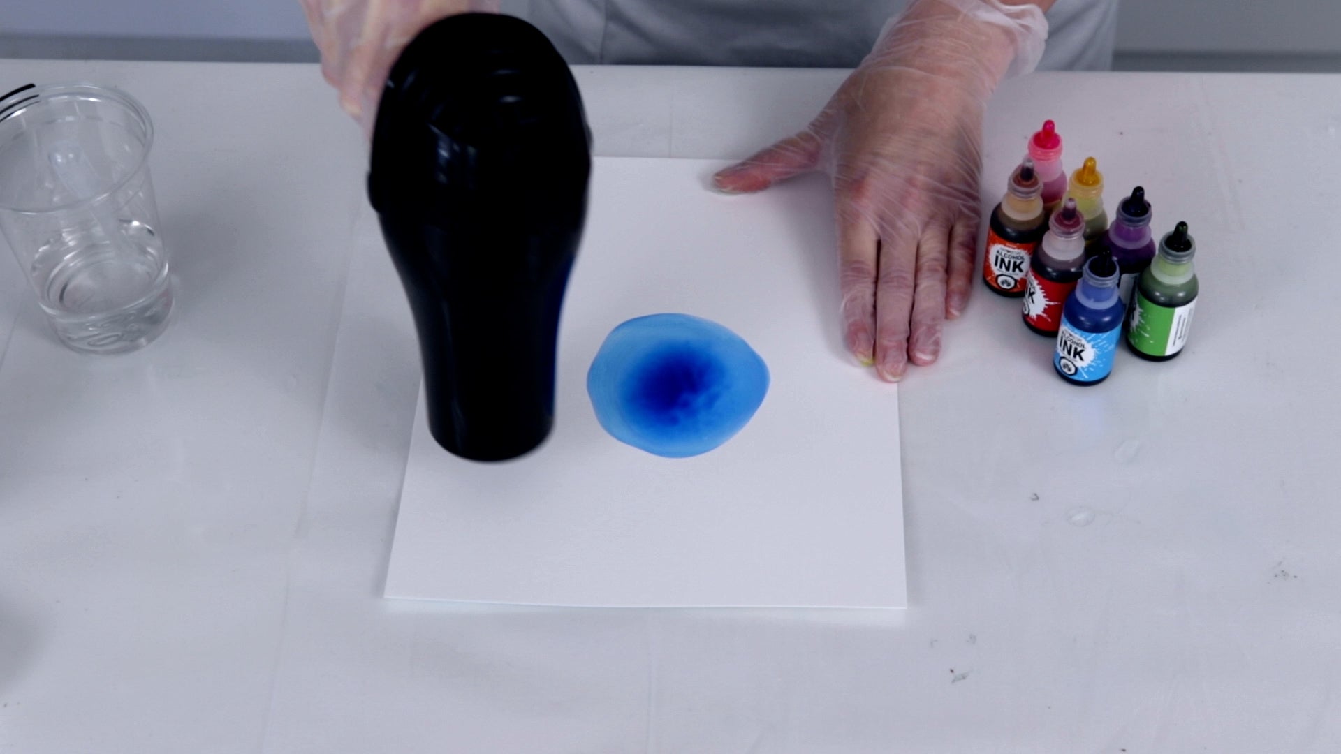 use a blow dryer to spread alcohol ink on yupo