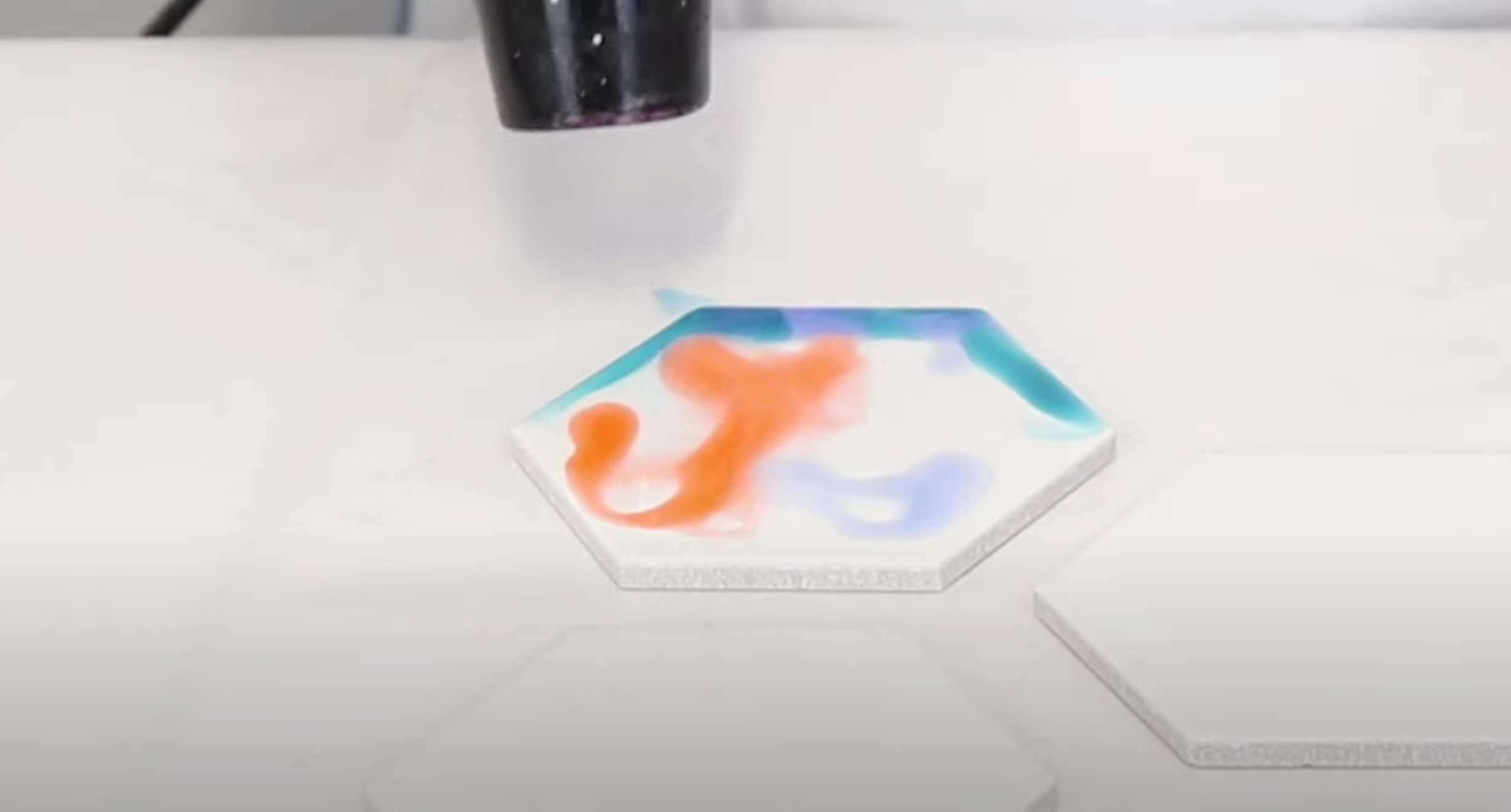 blow alcohol ink with hair dryer