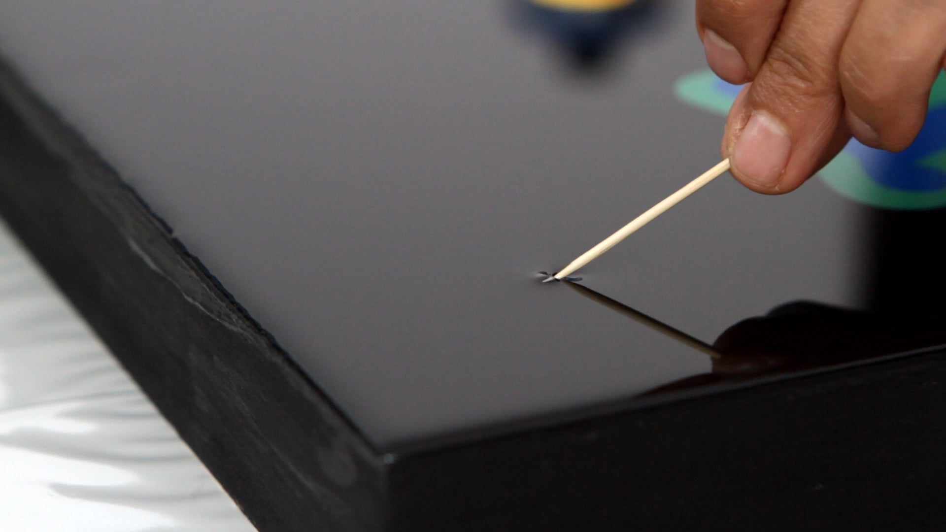 remove dust from resin with toothpick