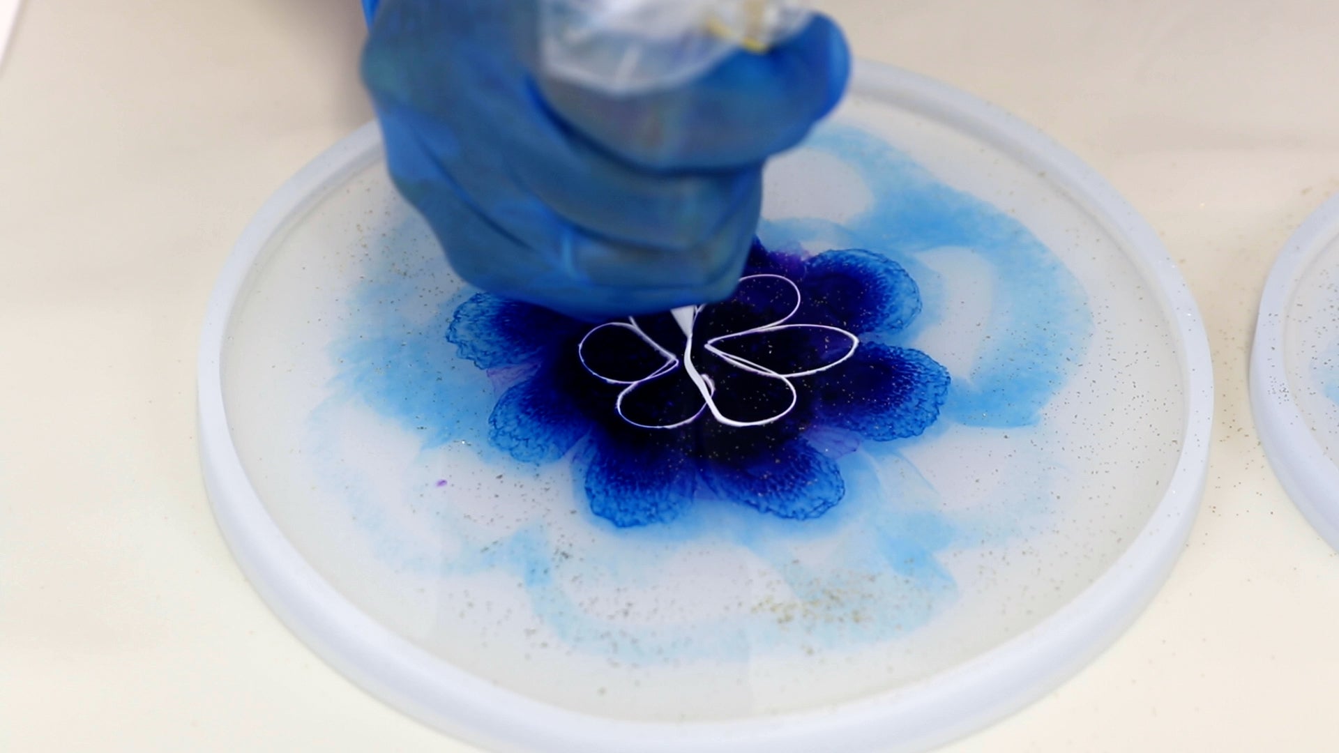 create a row of petals with white resin