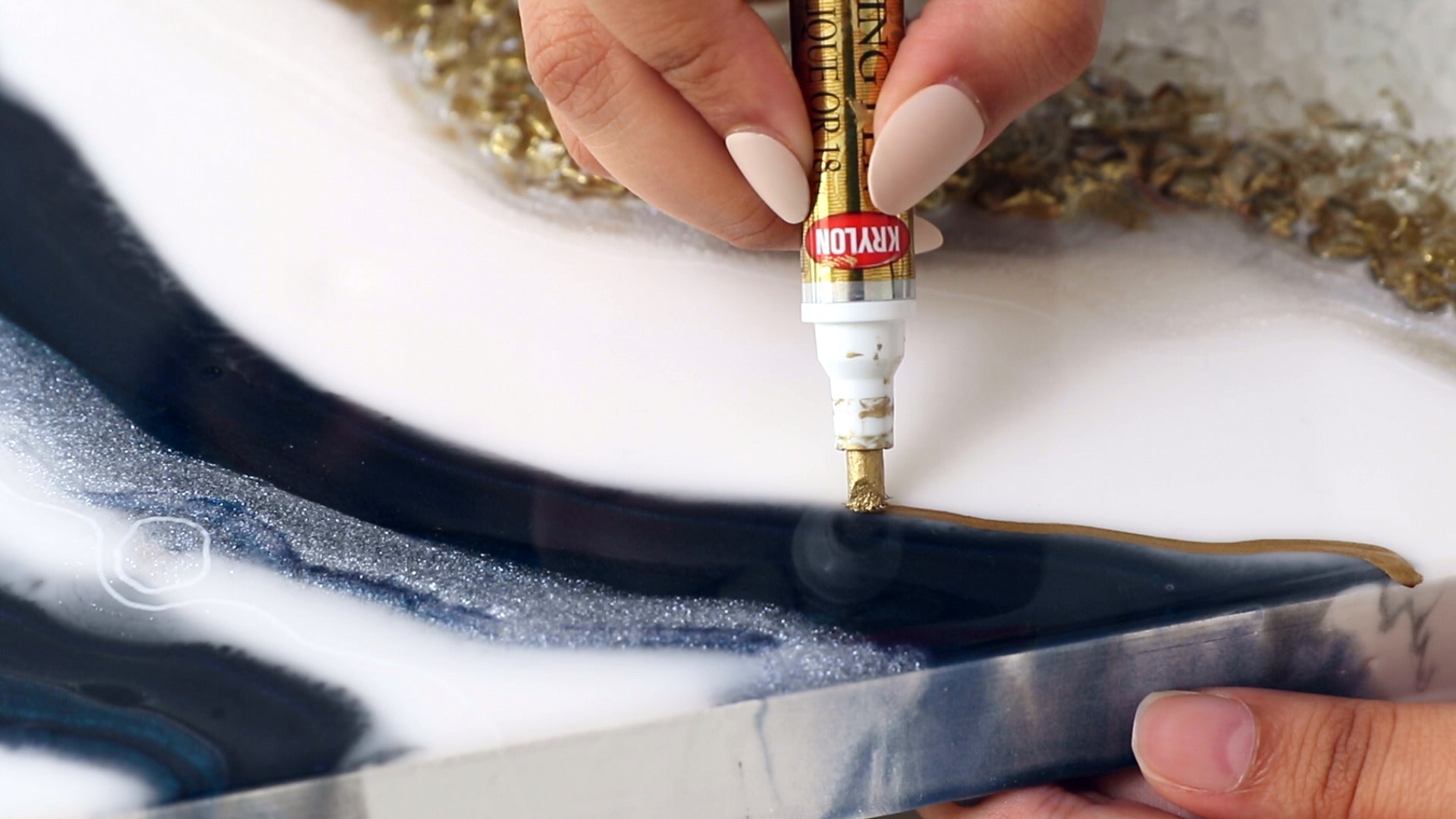 gold paint marker guidelines on resin geode art