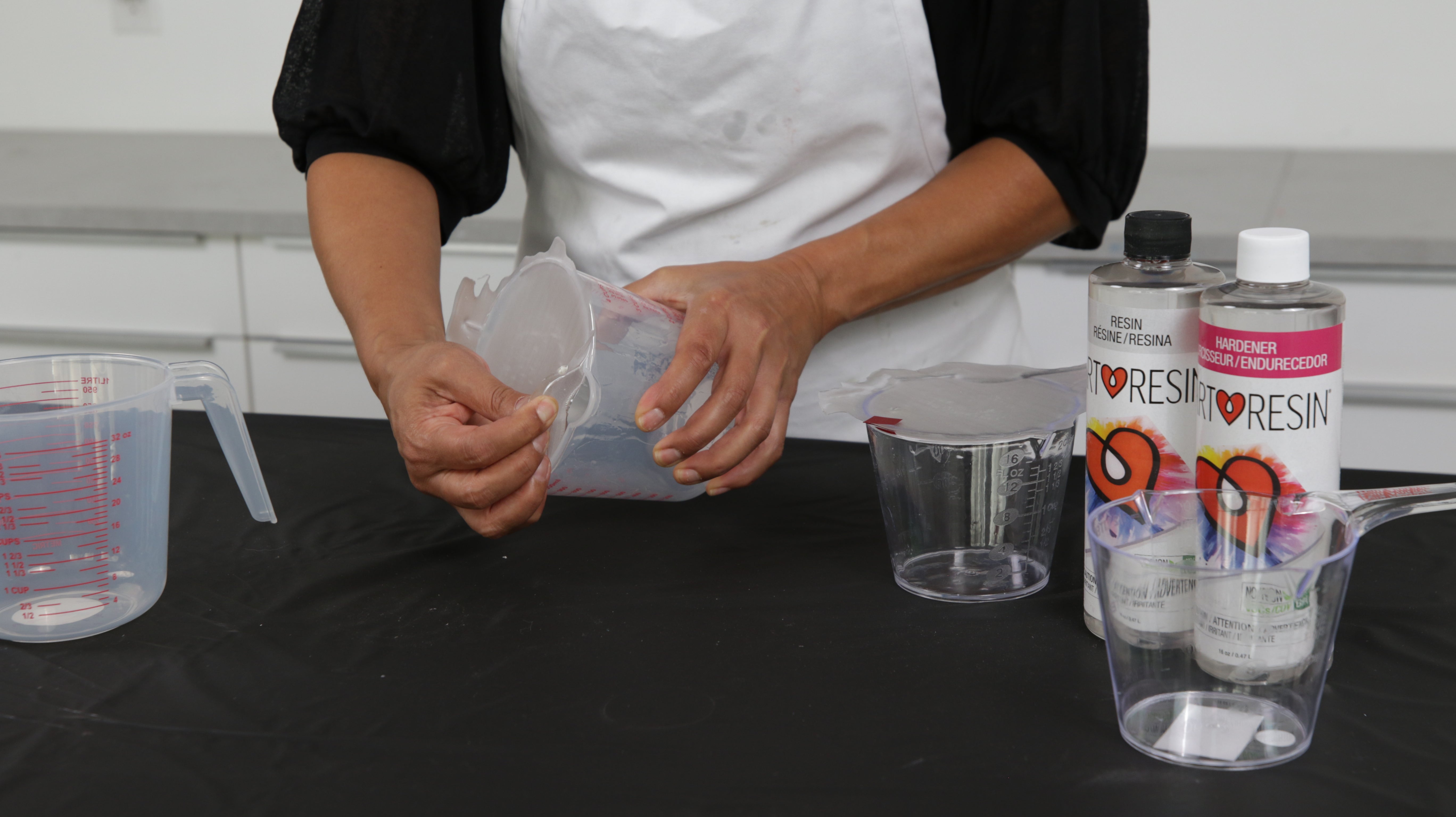 peeling resin out of measuring cup