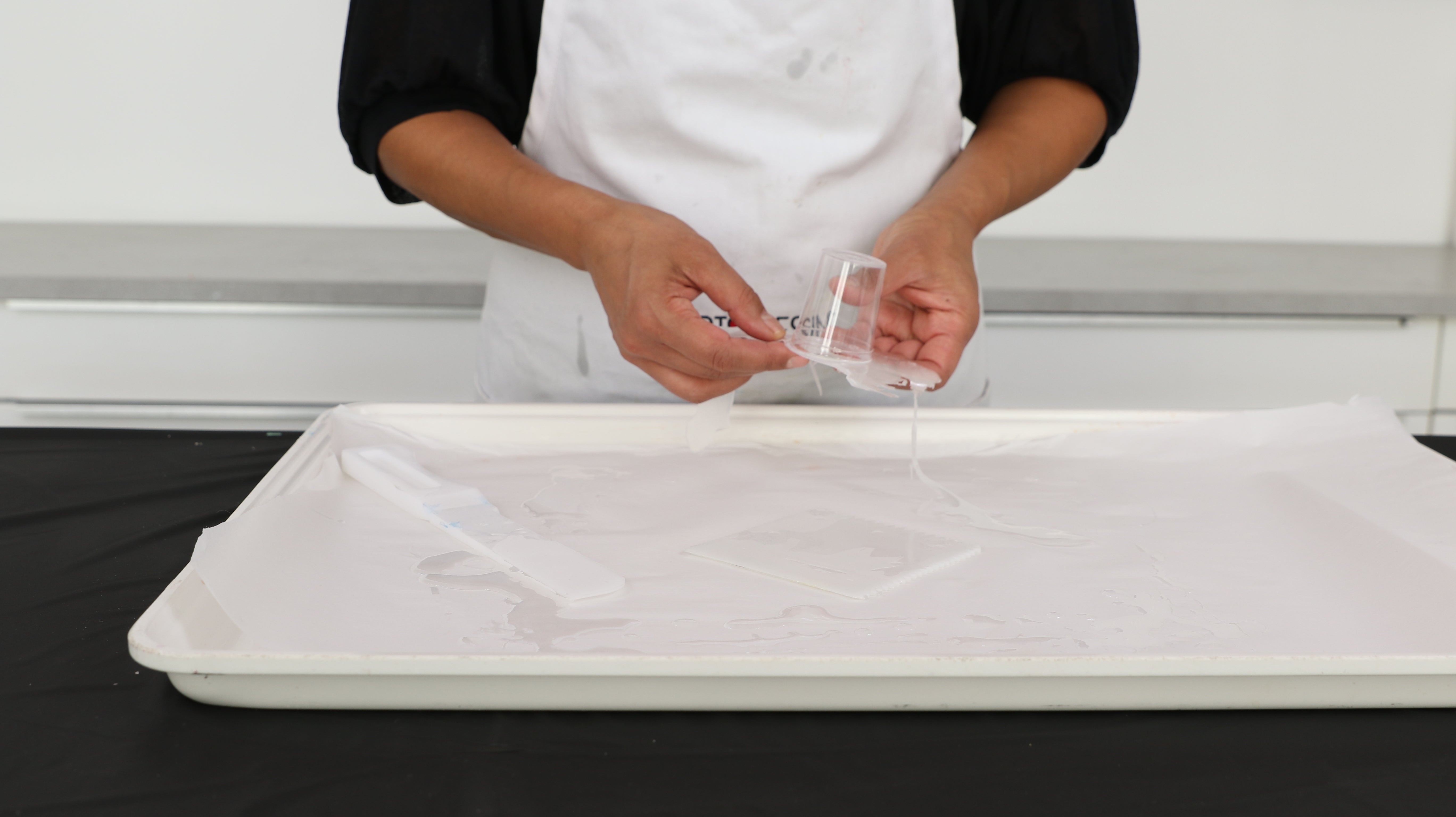 resin peels off of parchment paper