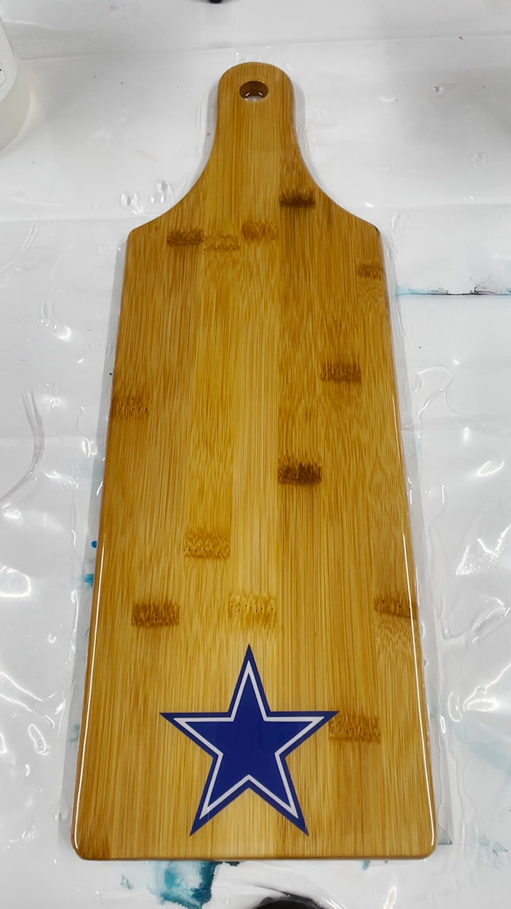 sports themed charcuterie board made with epoxy resin and cricut vinyl decal