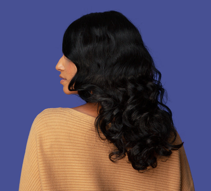 woman with a 15 inch straight wavy hair wig