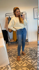 white sweater and skinny jeans