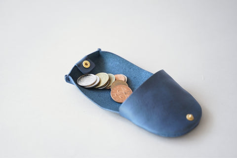 Taking out coins from the coin purse