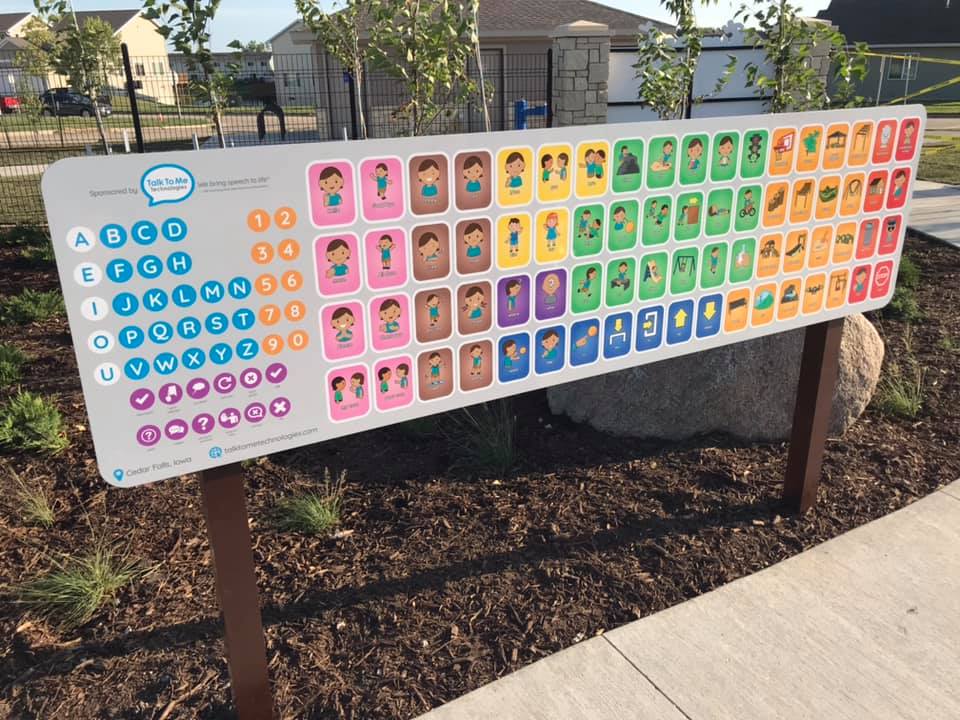 Communication board at place to play park in cedar falls