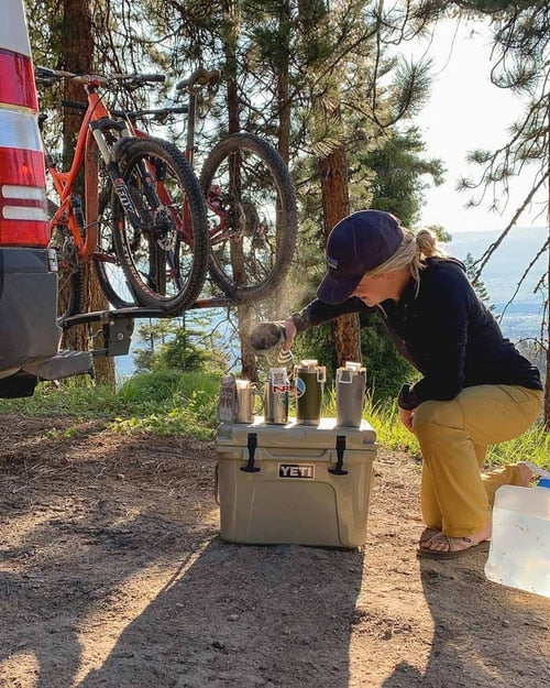 Using a jetboil to brew coffee on a biking trip