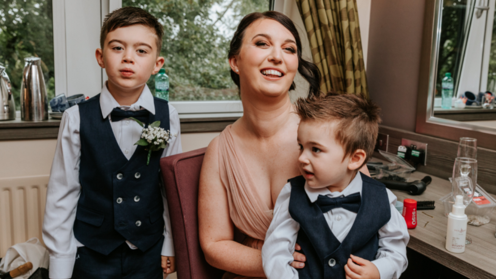 My sister-in-law, Claire, and her two sons, our nephews, Oliver and Alex. Oliver was our ring bearer.