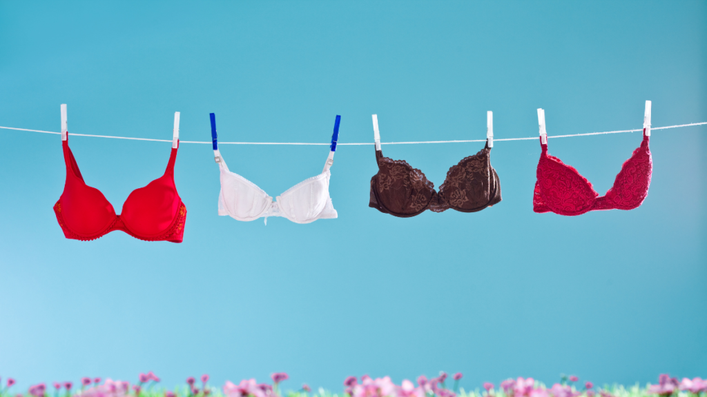 READ THIS BEFORE YOUR SHOP FOR A BRA! - Tria Beauty UK - image of bras hung out on a washing line