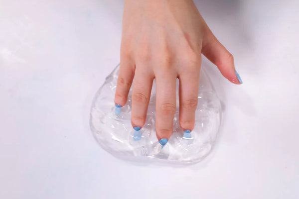 crystal clear slime being poked