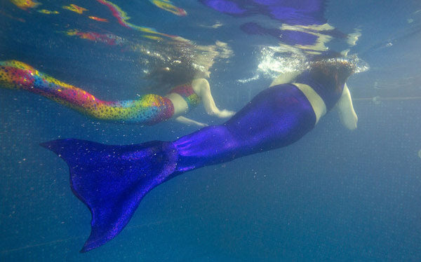 Mermaids underwater from Planet Mermaid