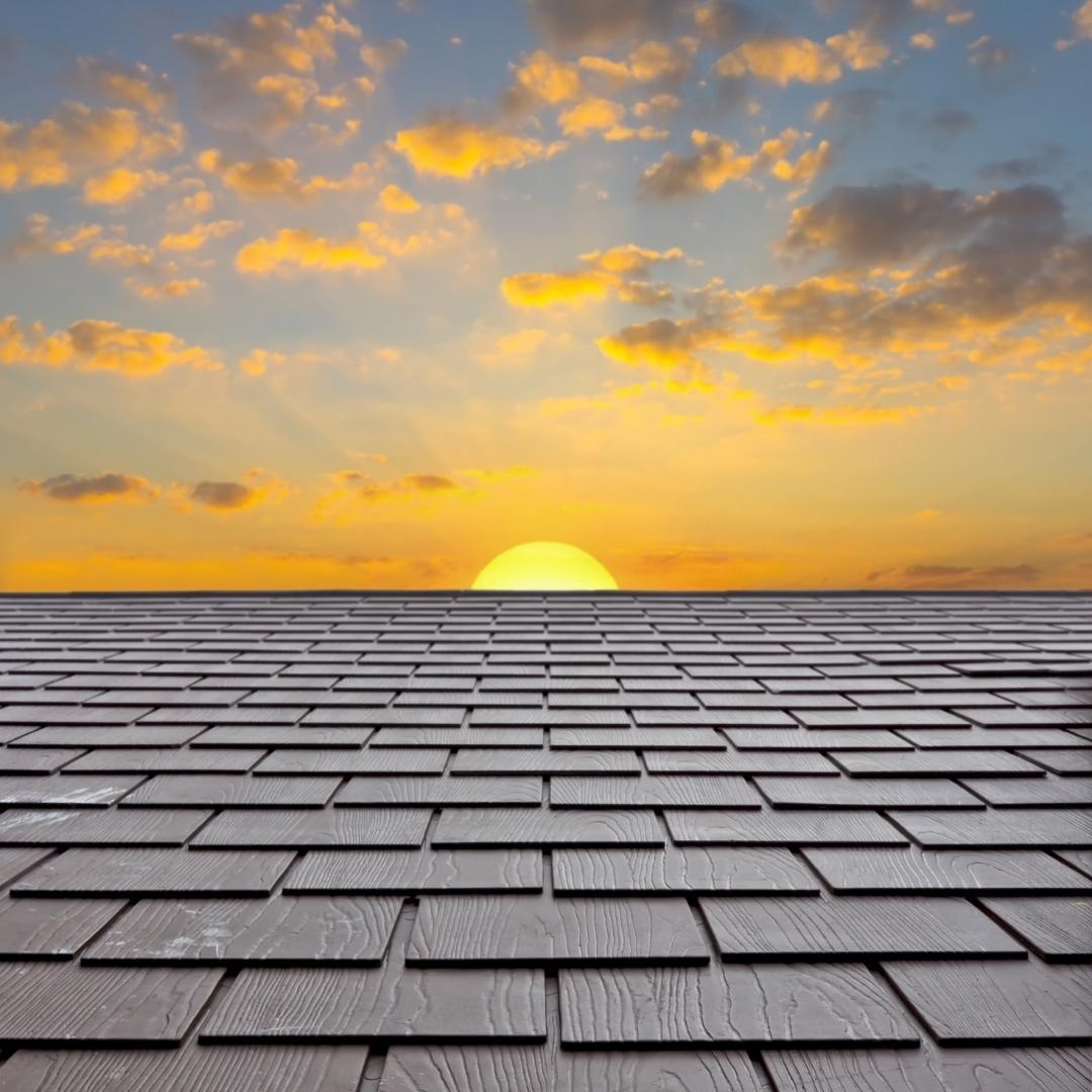 Sun Setting Over Roof