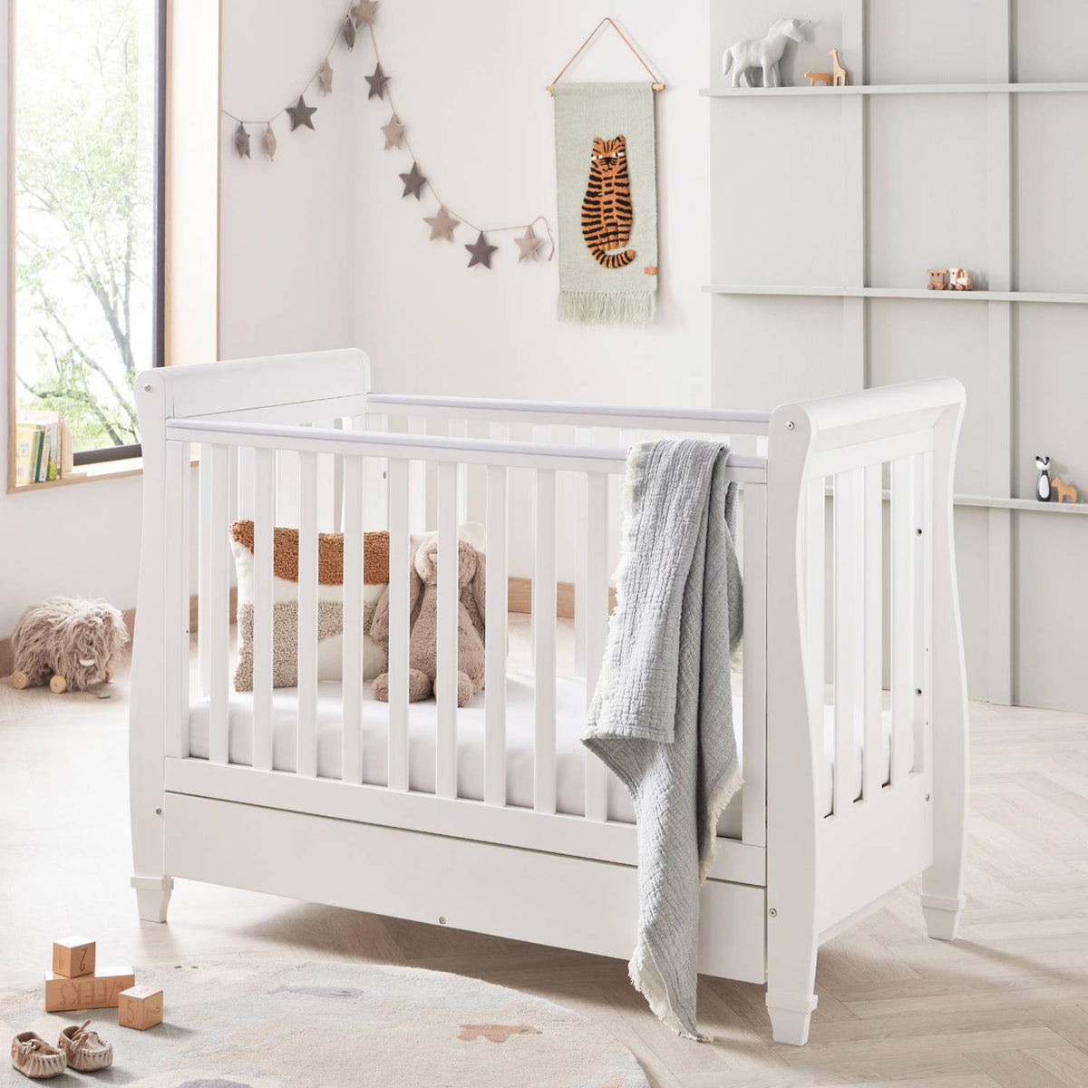 Babymore Eva Sleigh Drop Side Cot Bed in White colour