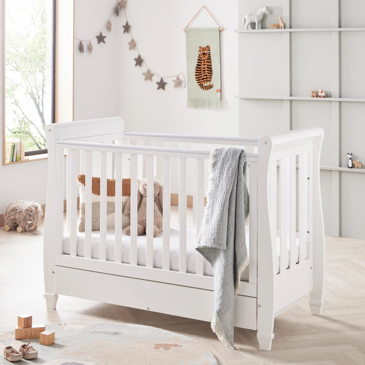 Babymore Eva Sleigh Drop Side Cot Bed in White colour