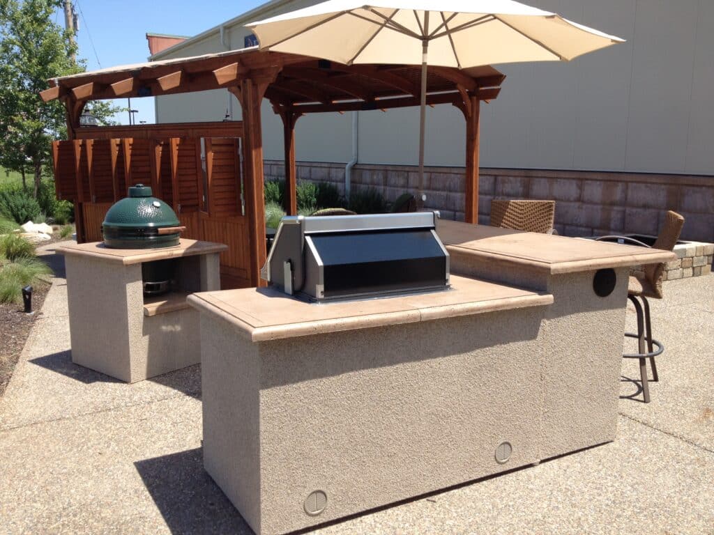 The first steps in an Outdoor Kitchen Design Step-by-Step Guide by The Outdoor Greatroom Company are determining your needs and goals, choosing the location, and planning the layout.