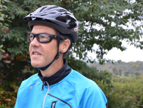 Man cycling in 7eye AirShield windproof glasses