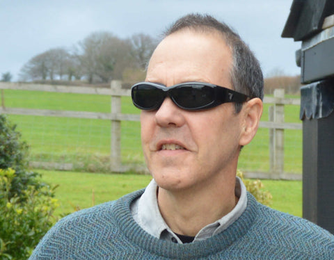 John wearing Chubasco gloss black with polarised grey lenses