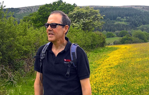 John wearing his Kai glasses on a hike in Dartmoor