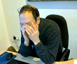 John suffering from computer-related dry eyes