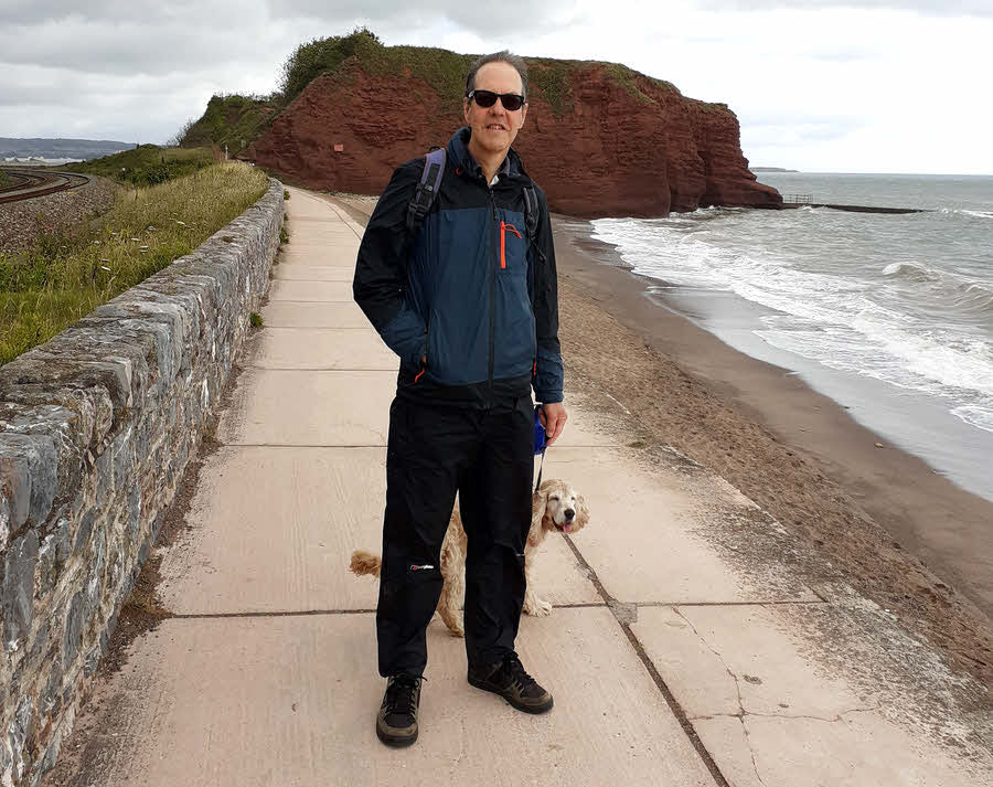 Wearing windproof sunglasses on a seaside walk