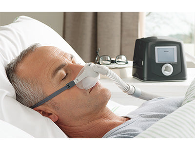 NCPAP machine covering mouth and nose