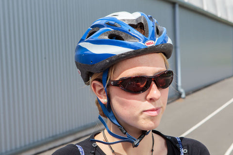 woman cyclist wearing 7eye AirShield Viento glasses