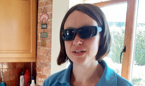 stylish wraparound sunglasses look good on this young woman