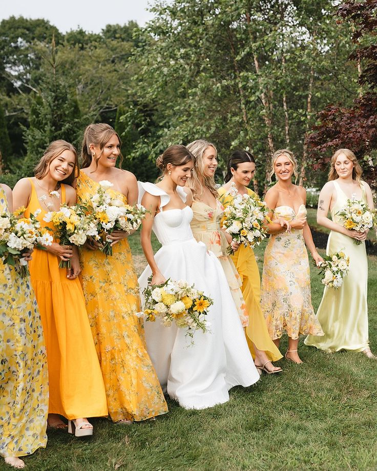 Bridesmaids wearing matching dresses in wedding ceremony