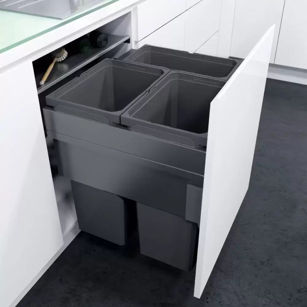 A Vauth-Sagel in-cupboard bin with storage shelf storing liners and a cleaning brush
