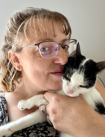 Jen holding tuxedo kitten