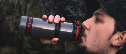 Man drinking from Water to Go Active water filter bottle