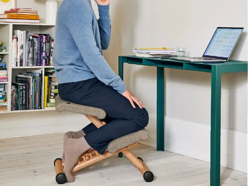Man Using Kneeling Chair in Office Multi