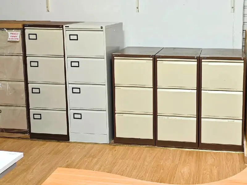 Three Filing Cabinets of Different Size