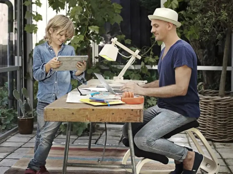 Varier Balans Kneeling Chair with a User