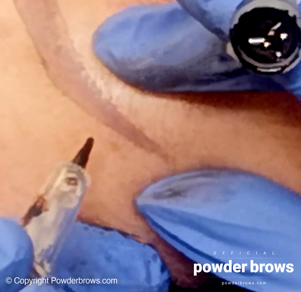 Hand positioning when doing the powder brows procedure.