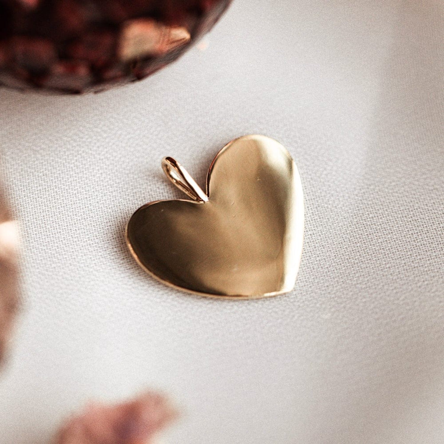 https://cdn.shopify.com/s/files/1/0773/3261/products/ExtraLargePlainHeartCharm.jpg?v=1703091355